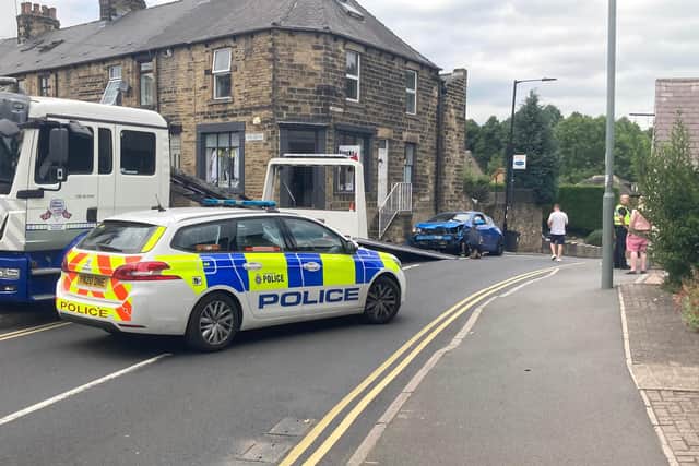 A car crashed into a wall on High Street in Ecclesfield on August 8, 2020.