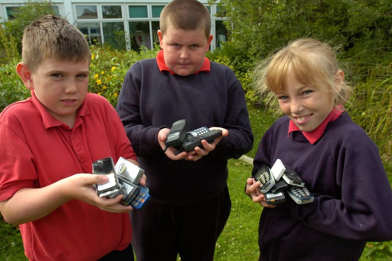 Richard Jackson, Jack Cunningham and Ellie McLurg were pictured with a collection of donated mobile phones in 2009. Can you tell us more?