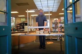 Pictured is Mark Crossland at Walkley Library where there is an order and collect service