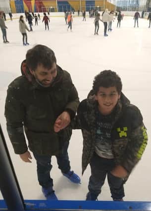 Young carer holding hands - Ice Sheffield