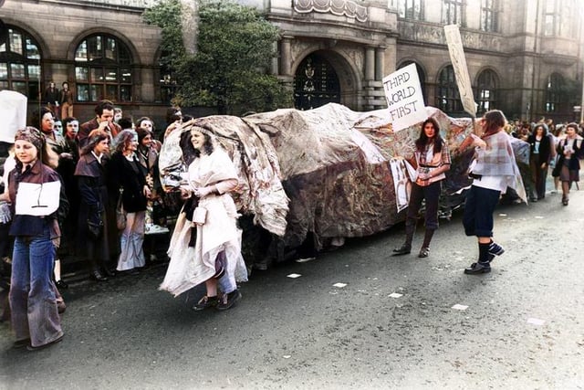 Sheffield University students walk along Pinstone Street in their annual Rag Day Parade October 25 1975. Picture: Sheffield Newspapers