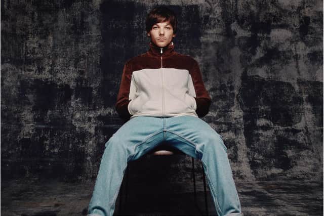 Louis Tomlinson has cancelled a tour date in Milan.