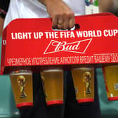SOCHI, RUSSIA - JUNE 23: A fan carries a four tray full of Budweiser beer during the 2018 FIFA World Cup Russia group F match between Germany and Sweden at Fisht Stadium on June 23, 2018 in Sochi, Russia.  (Photo by Stu Forster/Getty Images)