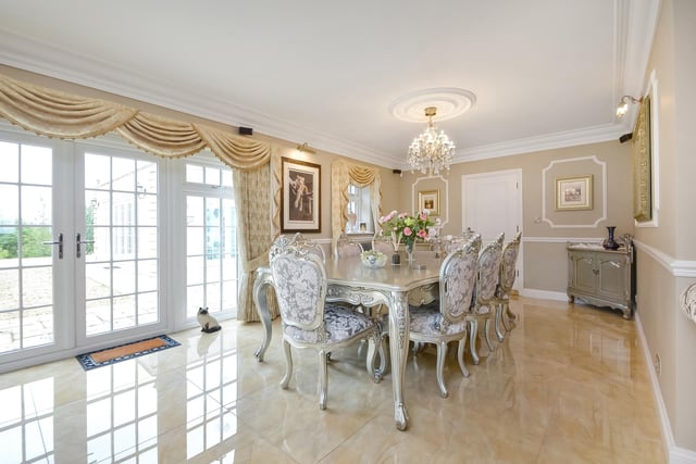 This huge five-bedroom Portsdown Hill home in Portsmouth is up for raffle. Pictured is the property's dining room.