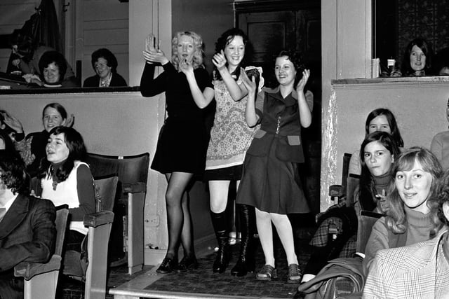 Three fans dancing at a Cliff Richard concert at the Odeon cinema in Edinburgh in November 1972.