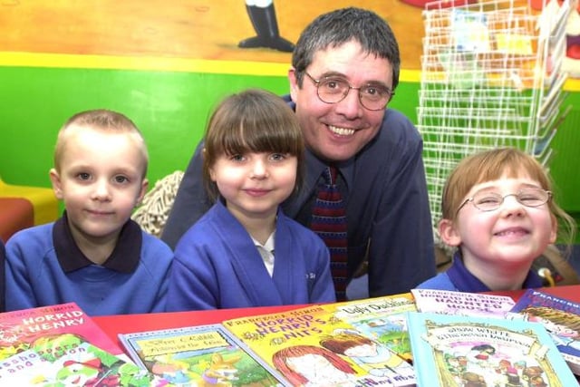 Children at Rosedale Primary School with their new books. 2001.