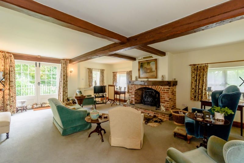 The drawing room has a feature fire place and chimney breast and French doors to the rear garden.