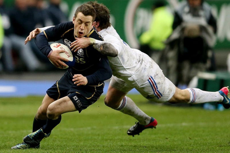 March 16, 2013, Six Nations: France 23, Scotland 16
Greig Laidlaw being tackled during the RBS Six Nations match between France and Scotland at the Stade de France in Paris. (Photo by Scott Heavey/Getty Images)