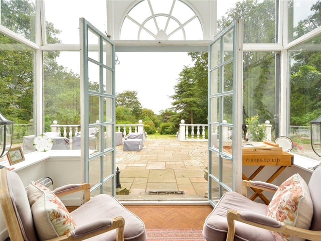Sunroom leading to garden.