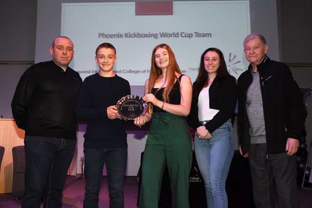 Dave Kilner, from the Sports Council, presents the Outstanding Team of the Year award to Phoenix Kickboxing Team members Stephen Sewell, Peter Gale, Alisha Stevenson and Amelia Connelly.