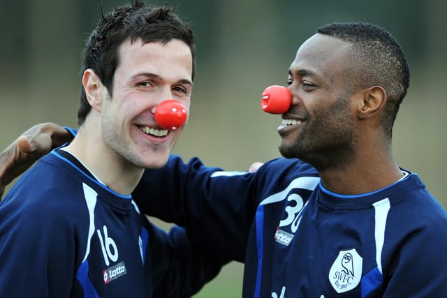 Pictured are Owls players Akpo Sodje and Richard Wood taking part in the Owls Wellie Wanging tournament at Middlewood Road training ground in aid of Comic Relief...the winner was team-mate Jermaine Johnson, February 2009
