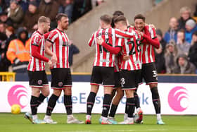 Daniel Jebbison (right) of Sheffield United celebrates with team mates after scoring their sides first goal during the Emirates FA Cup Third Round match at Millwall: Warren Little/Getty Images