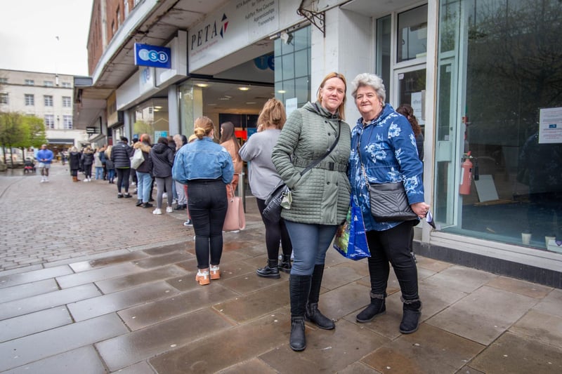 Julie and Susan Piggott queuing on Arundel Street to shop at Primark, Commercial Road, Portsmouth on 12 April 2021. Picture: Habibur Rahman