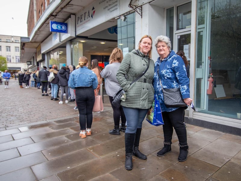 Julie and Susan Piggott queuing on Arundel Street to shop at Primark, Commercial Road, Portsmouth on 12 April 2021. Picture: Habibur Rahman