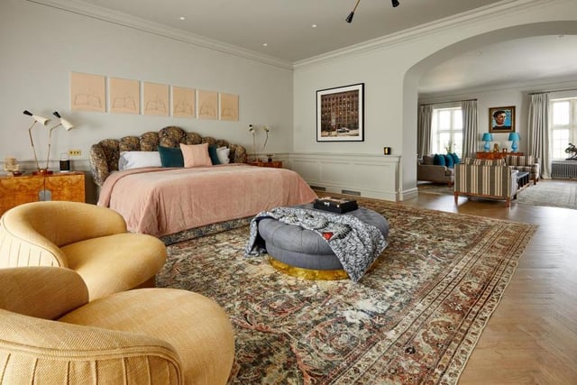Robbie's number one hit features seven bedrooms, including this huge one. The remarkable property has been recently restored to an exemplary standard. It even has its own cottage and two flats for staff.