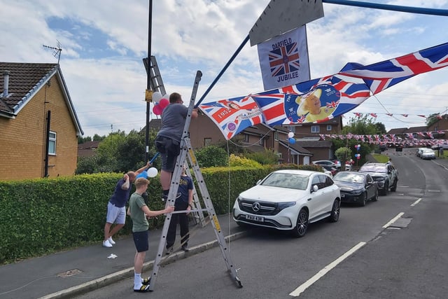 Decorating the street with flags and bunting