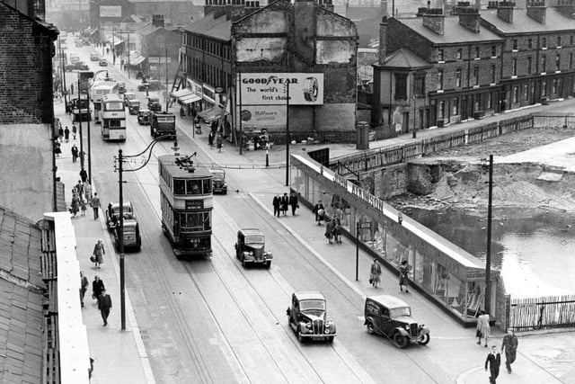 Trams and cars on The Moor, Sheffield, circa 1950.  To the right is the blitz damaged Atkinson's Department Store