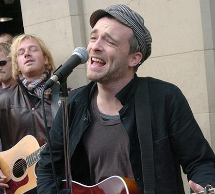 Travis perform outside Virgin on Fargate in Sheffield, on Monday October 11, 2004