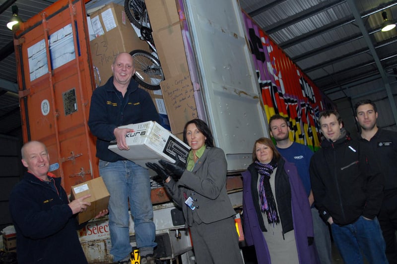 Nottinghamshire Police Aid Convoy is pictured loading its ninth container for its second trip to Ghana. 
The container was packed with items for orphanages and police equipment. Pictured with Paul Turner and David Scott, left, of Police Aid, are, from second left, Sara Smithurst of Nottinghamshire Police, Sharon Adey of Nottinghamshire County Council's Youth Services, James Skinner and Simon Piper, from the YMCA, and Shane Webb, from Nottinghamshire Police.