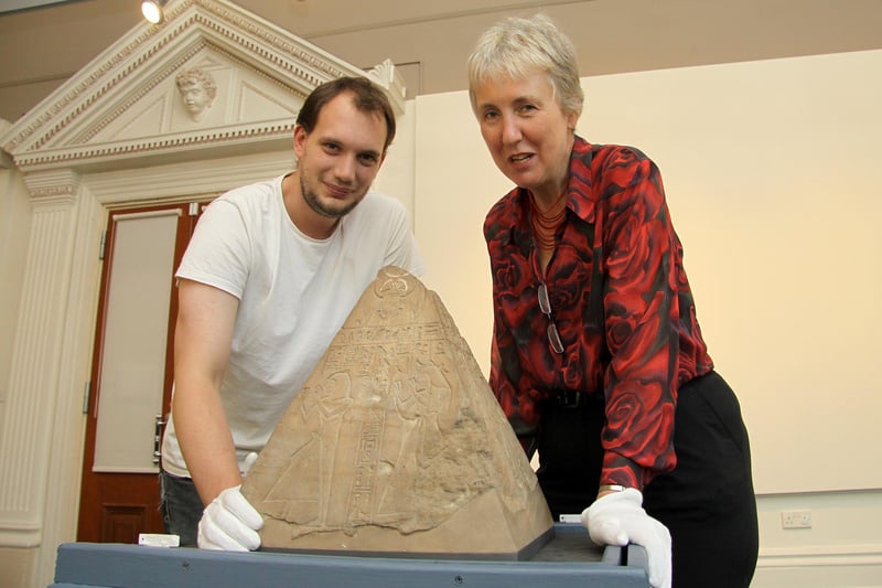 Jack Davy of the British Museum and Ros Westwood of Buxton Museum with the pyramid loaned by the British Museum back in 2012