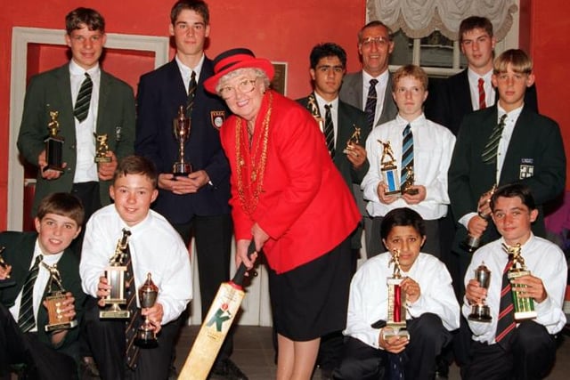 Mayor Dorothy Layton visited a group of young cricketers who had just won trophies in 1996.