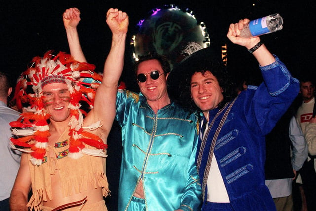Millennium revellers at the Don Valley stadium for the Gatecrasher event . In the party mood are these Sheffield lads, left to right, Mark Brumby, Anthony Townsend and Darren Sissons., December 3, 1999