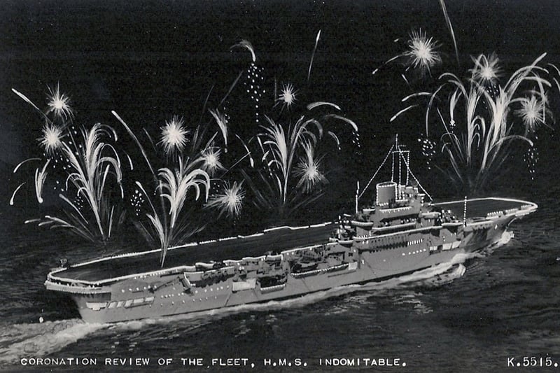 The fleet lit up for the Coronation fleet review at Spithead in 1953. HMS Indomitable. Picture: Avaon Davies