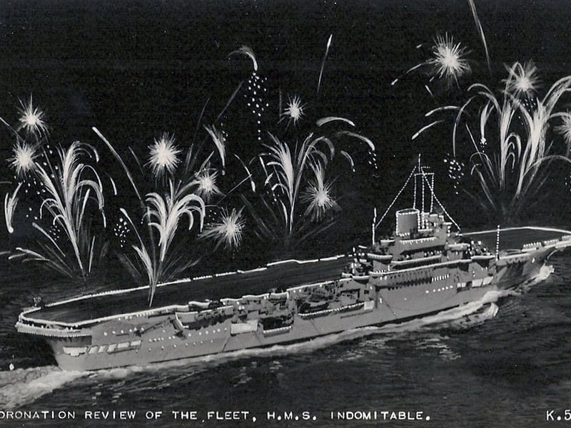 The fleet lit up for the Coronation fleet review at Spithead in 1953. HMS Indomitable. Picture: Avaon Davies
