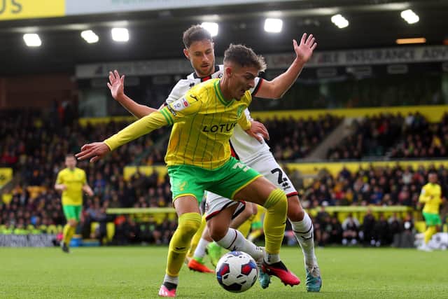 George Baldock of Sheffield United challenges Dimitris Giannoulis of Norwich City at Carrow Road: Simon Bellis / Sportimage