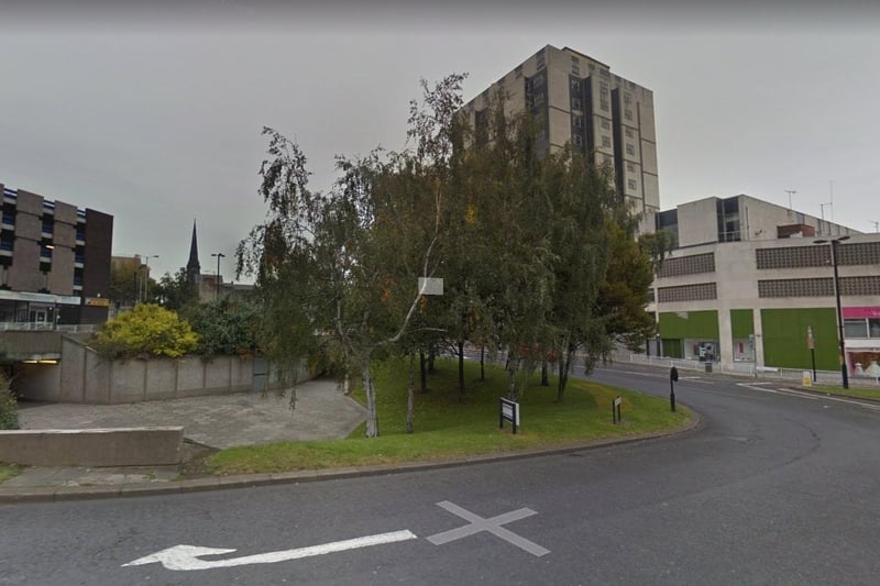 A Google Maps image from 2012 of a former underpass on Wellington Street with the Grosvenor House Hotel in the background (the cross on the ground is a Google feature)