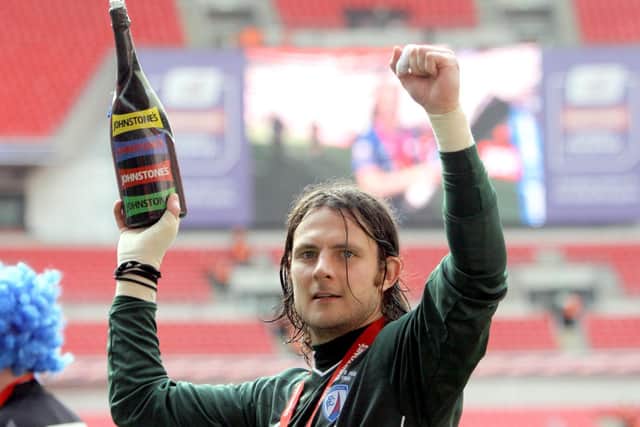 Chesterfield goalkeeper Tommy Lee celebrates the JPT win against Swindon Town at Wembley in 2012.