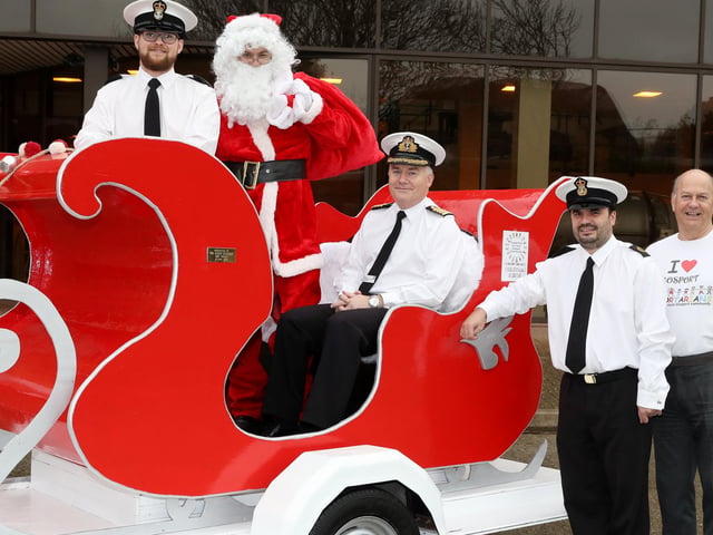 Pictured left to right PO Adam Hilton,  Father Christmas, Captain Peter Towell, CPO Chris 'Paddy' Gilkes from HMS Sultan and Malcom Dent as the navy team joins a festive event for the Gosportarians