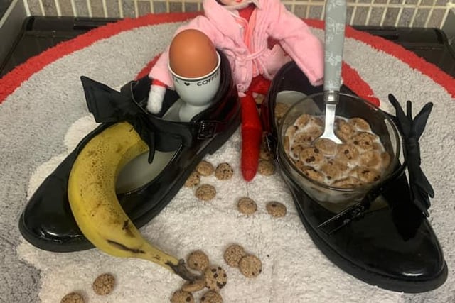 This naughty elf has stolen school shoes and filled them with breakfast food. From Michelle Ann Donohoe.