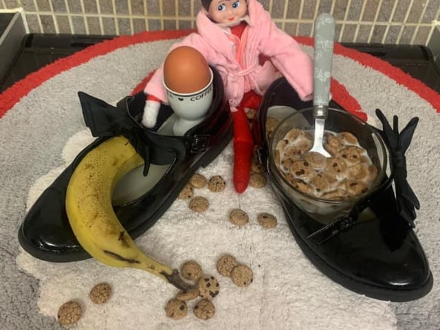 This naughty elf has stolen school shoes and filled them with breakfast food. From Michelle Ann Donohoe.