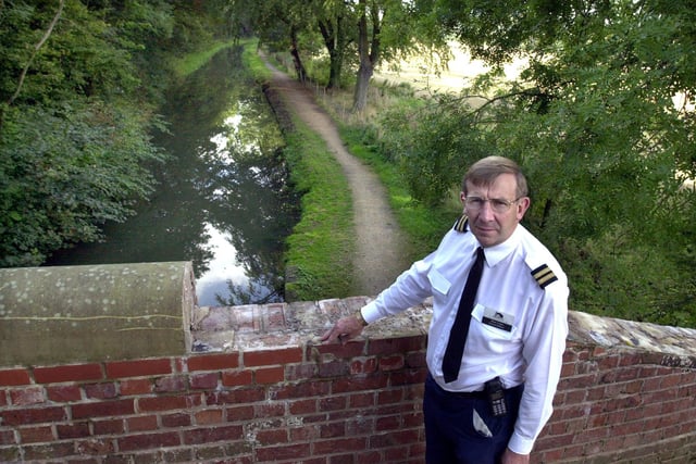 British Waterways patrol officer Allan Lindley on  the Pudding Dyke bridge between Turnerwood and Thorpe Salvin on the Chesterfield Canal which was severely damaged with coping stones brickwork and granite paving blocks removed and dumped in the canal in 2000