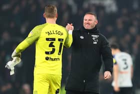 Derby County boss Wayne Rooney embraces Ryan Allsop after his side's win over Sheffield United (Mark Thompson/Getty Images)