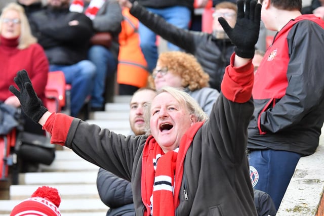 A Sunderland fan supports the Black Cats against Pompey.