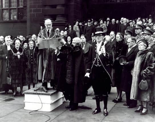 The Lord Mayor of Sheffield, Ald T W Bridgland, reading the Proclamation outside the main entrance of the Town Hall. February 8, 1952