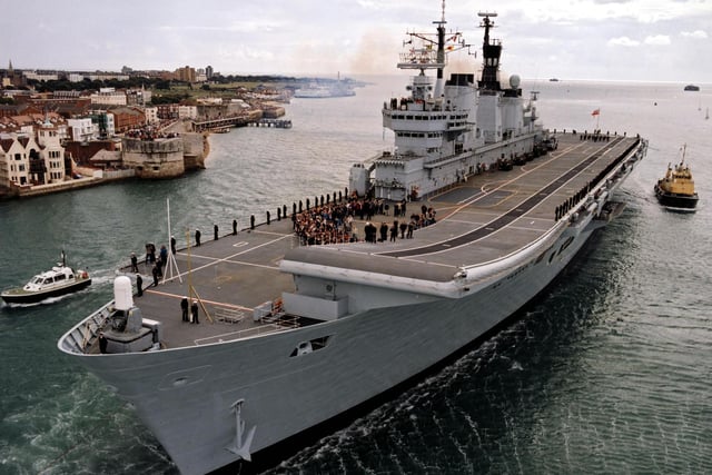 HMS Ark Royal returns to Portsmouth after her refit in Scotland.