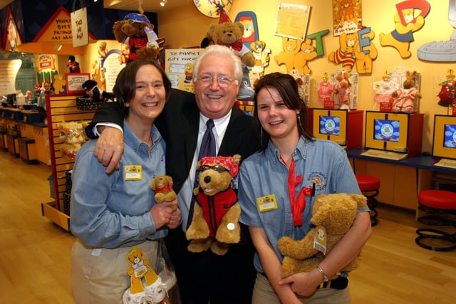 The opening of Build-A-Bear Workshop the first UK shop at Meadowhall in 2003. Sheffield Star's Alan Turner with Bear-builders and the bear he made, named "Beckham"