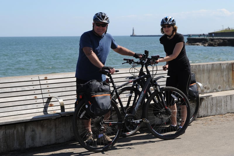 Enjoying the sunny weather at Seaburn - Polish cyclist's Robert and Julieta.
