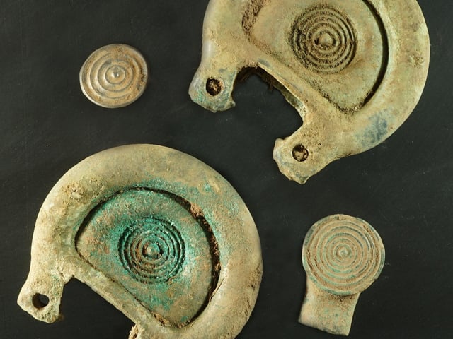 These decorative pieces come from a Bronze Age horse harness found near Peebles last month. The horse likely indicated power and status of the community it belonged to. PIC: Crown Office Communications/PA.