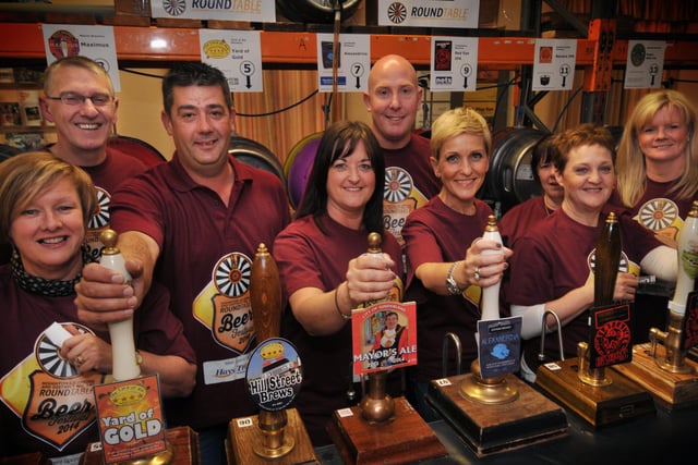Members of Houghton-le-Spring and District Round Table pictured behind the pumps on the opening night of their popular Beer Festival. Are you pictured in this 2014 scene?