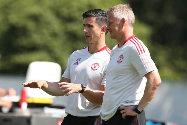 Former Manchester United boss Ole Gunnar Solskjaer looks on with coach Eric Ramsay during a pre-season training session last year (photo by Matthew Peters/Manchester United via Getty Images).