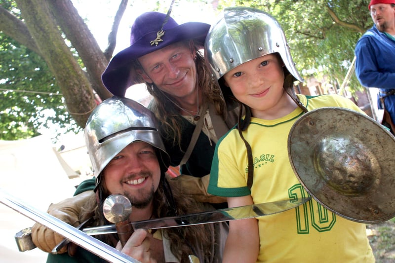 Chesterfield Medieval Market Simon Lee and John Wright from the Thomas Stanley Retinue with 8 year old Matthew Strawford.