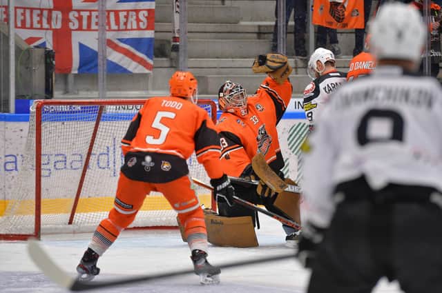 Sheffield Steelers' Barry Brust gets his glove to the puck against HK Gomel. Picture Dean Woolley