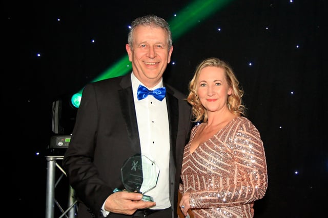 Shorts Chartered Accountants, Professional Services Award winner. Lucinda White, Managing Director of Pure Awards, pictured presenting the award to Chris Chambers.