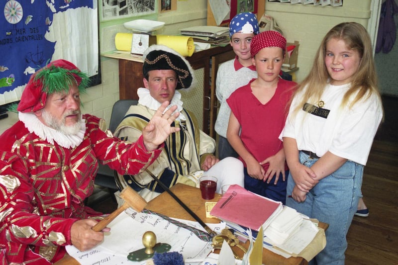 Pupils at Barnes Junior School travelled 500 years back in time when they took part in an auction depicting life in 1492.  Patrick Wood, left, and James Gibson from the University of Sunderland were pictured with pupils, left to right:  nine year olds Craig Patchett, Kelvin Fairley and Deborah Frazer.