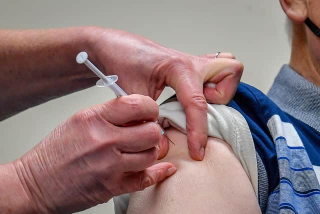 A single dose of the Oxford University/AstraZeneca COVID-19 vaccine is given to a patient (photo: Ben Birchall/PA Wire).