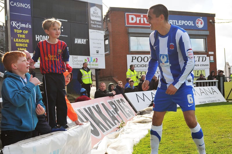 Evan Horwood chats to some young Pools fans at the end of the final home game of the season against Leyton Orient in 2012.